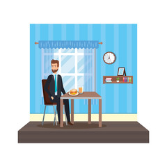 young businessman eating in livingroom