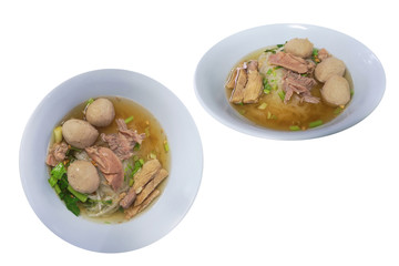 stew meat clear soup noodles , the food with the seasoning beef ball and vegetable. isolated on white background with clipping path.