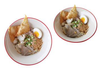 Thin rice noodles,the food with the seasoning fish ball fried wonton medium-boiled egg vegetable and other meats.with clipping path.Speaking Thailand " kuay teow sen lek tom yum "