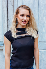 Fototapeta premium Attractive lady with blond hair and bright makeup