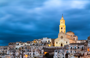 Fototapeta na wymiar Panoramic view to the town of Matera in Italy with historic buildings. Unesco heritage site