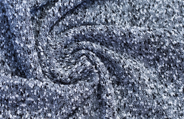 background of gray Jersey, twisted into a spiral