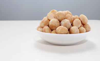 Snack nut food in a white bowl
