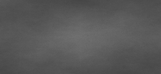 plain grunge stucco cement wall texture with scratches and cracks in dark color theme.