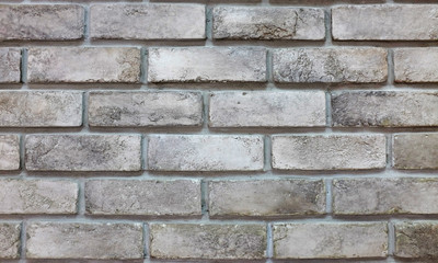 Background of grey brick wall.