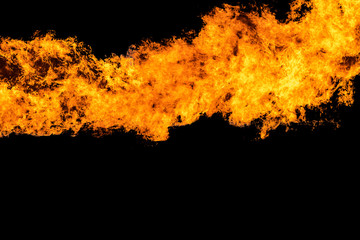 Flames caused by the explosion of the oil isolated on black background. Demonstration of water on...