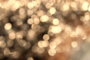 Obraz premium Golden Abstract bokeh light effect on background
