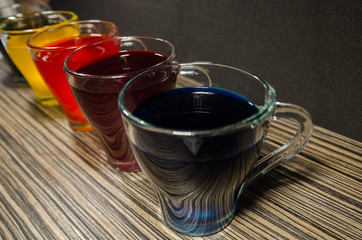 cups with colored water for easter