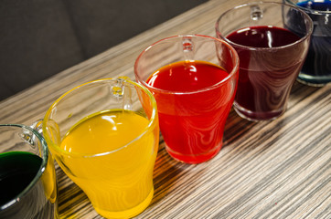 cups with colored water for easter