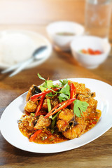 Fried fish with sweet chilli sauce served with steamed rice, Selective focus. Still life shoot in studio, Clean food good taste idea concept.