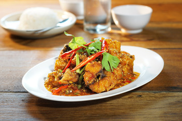 Fried fish with sweet chilli sauce served with steamed rice, Selective focus. Still life shoot in studio, Clean food good taste idea concept.