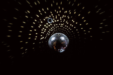 disco ball with highlights on the ceiling