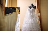white wedding dress on a mannequin