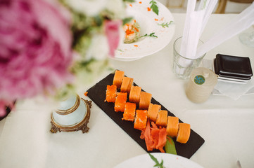 set of rolls on the table with a white tablecloth