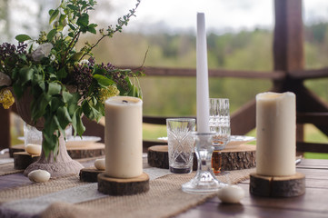 wooden table set with candles