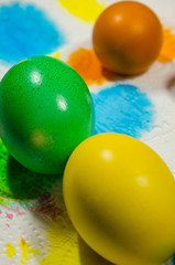 colored easter eggs on a white napkin