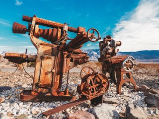 Old abandoned rusty mechanisms in the desert