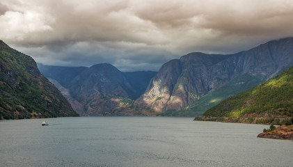 Ship sailing in Naeroyfjord. Taken from Flam cruise port in Norway