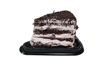 Black Forest cake with chocolate and white cream on the black plastic disposal stand