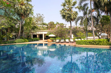 Fototapeta na wymiar Beautiful luxury swimming pool in tropical hotel pool resort
