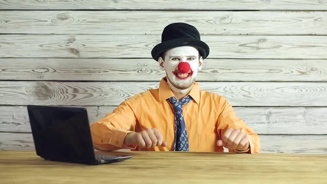 Clown businessman working in the office