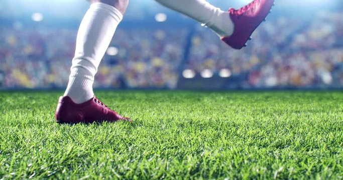 4k footage of the ball that is being kicked on the professional soccer stadium. The stadium and crowd are made in 3D and animated.