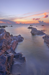 Fototapeta na wymiar Beautiful sunrise at Pandak Beach, Malaysia.