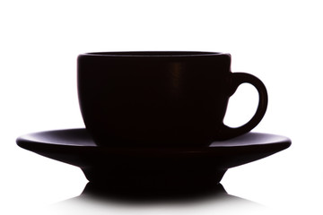 Silhouette of small cup with saucer for coffee isolated on white background