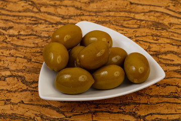 Green olives in the bowl