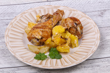 Roasted chicken legs with potato