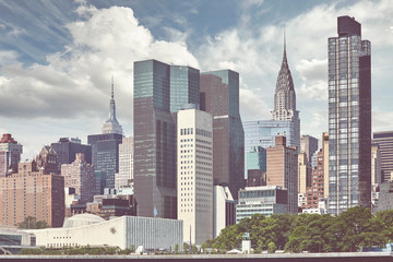 Fototapeta na wymiar New York City skyline seen from the Roosevelt Island, color toning applied, USA.