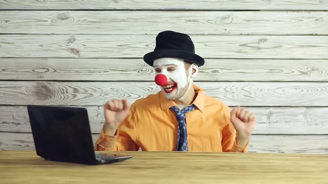Clown businessman working in the office