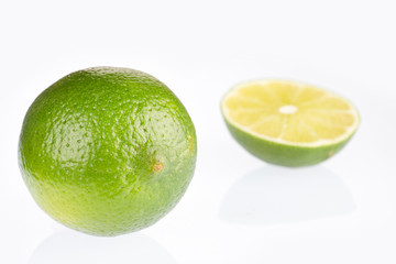 Tahiti lemon isolated on white background - Citrus × latifolia. Text space