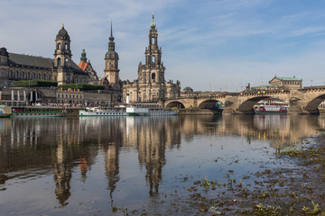 Fototapeta na wymiar Dresden, Germany - the Elbe River cuts Dresden in two halves, and its one the main landmarks of the city, offering a large number of amazing views. Here in particular the Old Town and Augustus Bridge