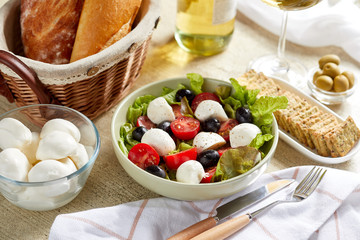 fresh salad with feta cheese and olives