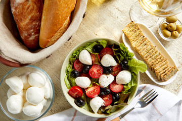 fresh salad with feta cheese and olives