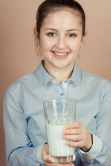 girl drinks milk and is happy