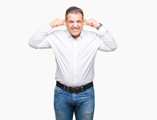 Fototapeta premium Middle age arab elegant man over isolated background Smiling pulling ears with fingers, funny gesture. Audition problem