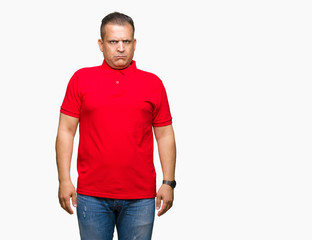 Fototapeta premium Middle age arab man over isolated background skeptic and nervous, frowning upset because of problem. Negative person.