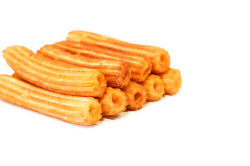 spanish fritters on white background