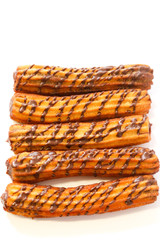 spanish chocolate fritters with white background