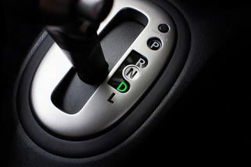 Put a gear stick into D position, (Drive) Symbol in auto transmission car.