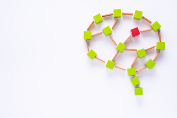 Head with colourful shapes of abstract brain.