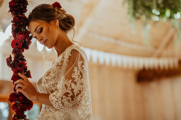 Beautiful young bride in white wedding dress
