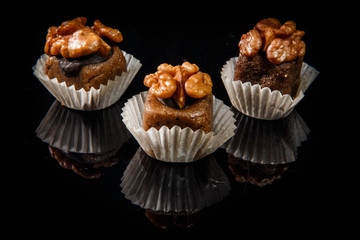 three healthy useful organic handmade candies with walnuts