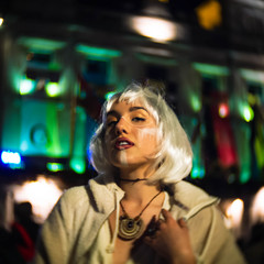 girl dressed up in carnival with white wig