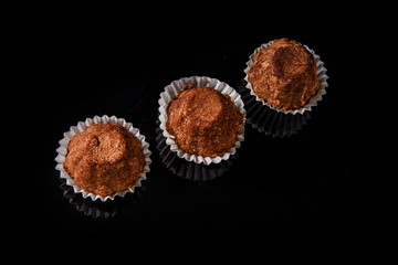 top view of three healthy useful organic handmade chocolate candies