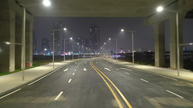 night illuminated zhuhai city empty traffic road bridge aerial panorama 4k china