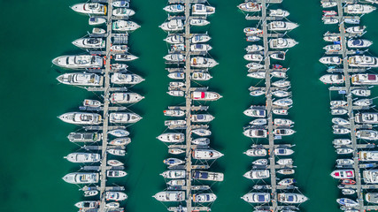 Yacht parking, A marina lot, Yacht and sailboat is moored at the quay, Aerial view by drone.