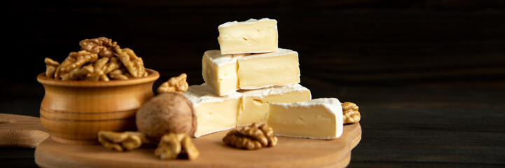 Cheese camembert or brie with walnut kernels